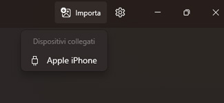Apri il programma Foto e clicca su "Importa" e poi su "Apple iPhone"